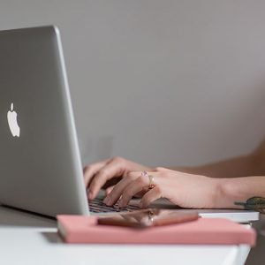 apple-computer-desk-lady typing apple-computer-desk-lady typing